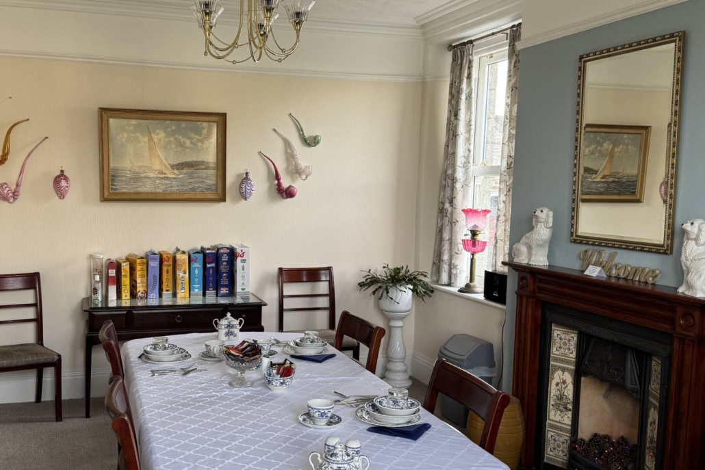 A dining room with a large dining table